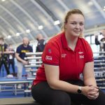 Lucy Holt sat down wearing a red Help for Heroes t-shirt