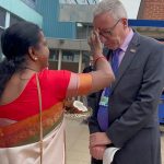 The Trust’s Chief Executive Andrew Morgan with Geetha Ramana receiving Tika at the traditional inauguration event.
