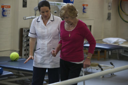 Physiotherapist with patient