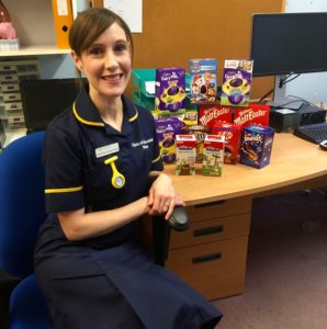 Sam with some of the Easter eggs collected at Lincoln County Hospital.
