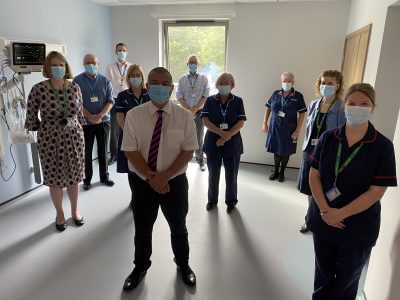 Professor Jonathan Van-Tam with staff in the Captain Sir Tom Moore Plural Procedure room as part of the new £4.5 million specialist respiratory unit for Lincolnshire patients.