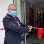 Professor Jonathan Van-Tam cuts ribbon