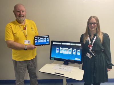 Volunteer James Heston and Safeguarding and Vulnerabilities Nurse Specialist for Dementia Zoe Chapman with RITA.