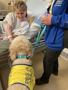 Patient Lexi Jones with Ruby during a visit to Lincoln County Hospital