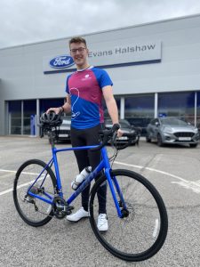 Harry Alcock with his bike