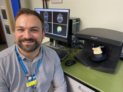 Charity Manager Ben Petts with the scanner to digitise old models