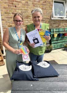 L-R) Safeguarding and Vulnerabilities Nurse Specialist for Dementia Zoe Chapman and Patient Experience Manager Sharon Kidd with the bags.