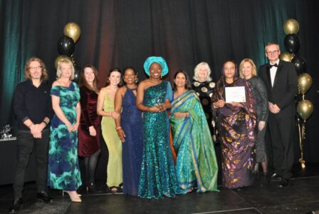 The Black and Asian Maternal Health Group with their award smiling at the camera