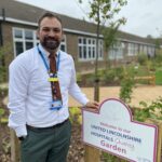 Ben Petts, a man standing in the charity garden