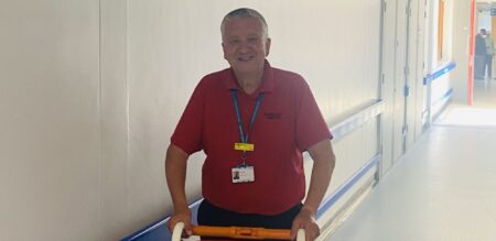 hospital porter with a wheelchair