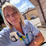 Health Care Worker sat outdoors