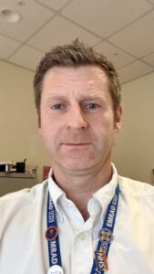 Photo of Paul Clark, looking at the camera