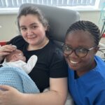 Neonatal Nurse Anita Adu Mensah with Louise Millhouse and baby Arabella