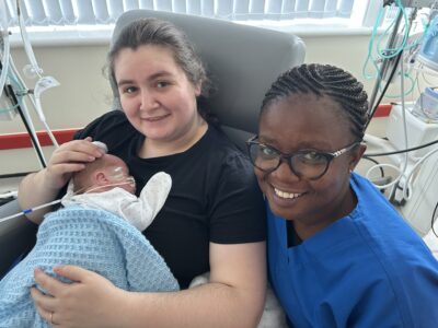 Neonatal Nurse Anita Adu Mensah with Louise Millhouse and baby Arabella