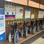 a row of wheelchairs at entrance to a hospital