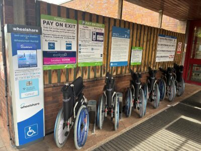 a row of wheelchairs at entrance to a hospital